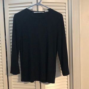 Dark navy blue tight knit sweater.